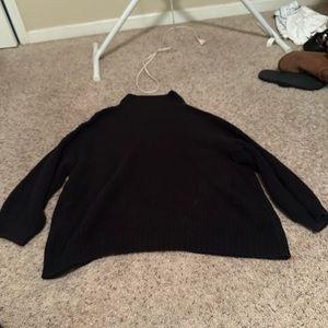 Black turtle neck sweater
